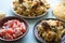 Uzbek pilaf with meat, tomato salad and bread cake