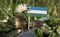 Uzbekistan flag with stack of money coins with grass