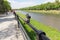 Uzhgorod, Ukraine - April 27, 2016: Small bronze statue of Good Soldier Svejk attached to the handrails at embankment