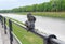 Uzhgorod, Ukraine - April 27, 2016: Small bronze statue of Good Soldier Svejk attached to the handrails at Kyivska embankment of