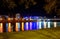 UZHHOROD, UKRAINE - FEBRUARY 20, 2020: Reflection of buildings and lanterns in the river Uzh in the city Uzhhorod