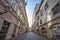 V kotcich, a narrow street with medieval buildings and cobblestones in the old town of Prague, also called Stare mesto.