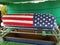 VA Veteran funeral casket draped with America`s Flag