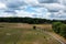Vaalbeek, Flemish Brabant Regio, Belgium - Landscape view over green meadows, woods and a walking trail at the nature reserve