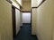 Vacant corridor or abandoned corridor with carpeted floor[4]