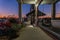 Vacant modern store building exterior at sunset