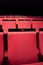 vacant theater with red seats