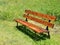 Vacant wooden bench in the park in summer