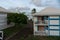 Vacation cottage houses with a path on a Caribbean island of Guadeloupe