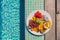 Vacation food fruit plate breakfast top view by the hotel swimming pool background. Luxury resort holiday lifestyle