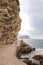 Vacation in Montenegro near Morgen beach on the wild nature. Girl travels in the mountains and rocks.