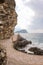 Vacation in Montenegro near Morgen beach on the wild nature. Girl travels in the mountains and rocks.