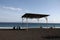 Vacation photo - Beach with black sand in Bali, sea, shed.