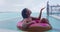 Vacation rain - funny video of woman on donut float in luxury pool