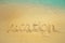 Vacation on the sand beach concept. Vacation Time words written into the sand on the beach.