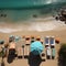 Vacation setup Sandy beach seen from above, bordered by towel and summer items