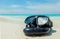 Vacation Start Here Concept, Scuba Diving Equipment On The White Sea Sand Beach with Crystal Clear Sea and Sky in Background used