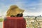 Vacation and travel. Suitcase or luggage bag with hat, Photo camera and Sun glasses with city view background