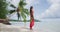 Vacation travel woman relaxing on paradise beach on holidays on Bora Bora