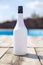 Vacation white alcohol bottle