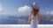 Vacation woman luxury travel looking at Santorini