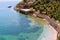 Vacationers bathe and sunbathe against the background of the ancient fortress wall Alanya, Turkey