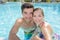 Vacationing couple in pool