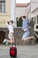 Vacations Travel Ideas. Happy Caucasian Couple Having Fun and Jumping Together During City Traveling