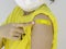 Vaccinations, bandage plaster on vaccinated people`s arm concept.
