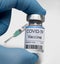 Vaccine against coronavirus COVID-19 in vial at Pfizer medical laboratory