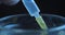 Vaccine syringe slow motion macro close up studio in 4K, prores HQ, Covid-19 pandemic