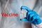 Vaccine text. Doctor, nurse, scientist hand hold COVID-19 vaccine for the disease Coronavirus. Use for prevention, immunization