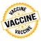 VACCINE text on yellow-black round stamp sign