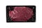 Vacuum black plastic pack with fresh beef steak isolated