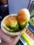 Vada pau bread and green sauce and green chili on a plate