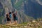 VAL GRANDE, ITALY - Apr 25, 2018: Female hikers pointing and looking at a beautiful view from a mountain top