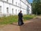 VALAAM, RUSSIA. A monk walks through the territory of the Valaam Transfiguration Stavropegial Monastery. Karelia