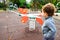 Valencia, Spain - April 26, 2020: Children observe a playground closed for health security to avoid virus infections