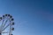 Valencia, Spain - December 14, 2018: fairground with big ferris wheel at dusk