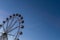 Valencia, Spain - December 14, 2018: fairground with big ferris wheel at dusk