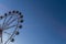 Valencia, Spain - December 14, 2018: fairground with big ferris wheel at dusk