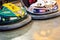 Valencia, Spain - December 14, 2018: Two children`s bumper cars competing among them at an amusement park