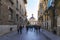 Valencia, Spain - January 2, 2020: People walking in Carrer dels Cavallers street, in old town of Valencia, Spain