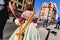 Valencia - Spain, March 16, 2019: Girl dressed as a faller accompanied by her mother crossing a street in Valencia