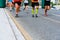 Valencia, Spain - May 19, 2019: Legs of unrecognizable runners running towards the finish line of an amateur race