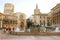 VALENCIA, SPAIN - NOVEMER 27, 2019: Plaza de la Virgen square with Cathedral and Fuente del Turia fountain in Valencia, Spain