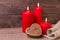 Valentine background. Red candles, a box in the form of a heart in rustic style . Selective focus. Copy space
