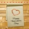 Valentine card with hearts and wooden boards background - vector