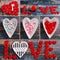 Valentine collage with love symbols on wooden background