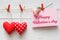Valentine day background, pillow hearts border on wood, copy space